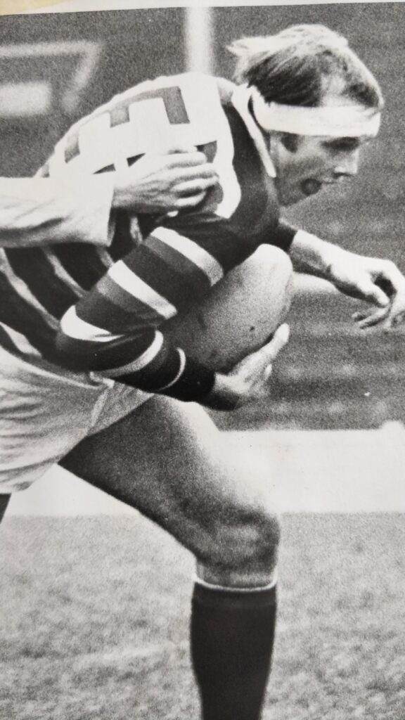 Eric playing rugby